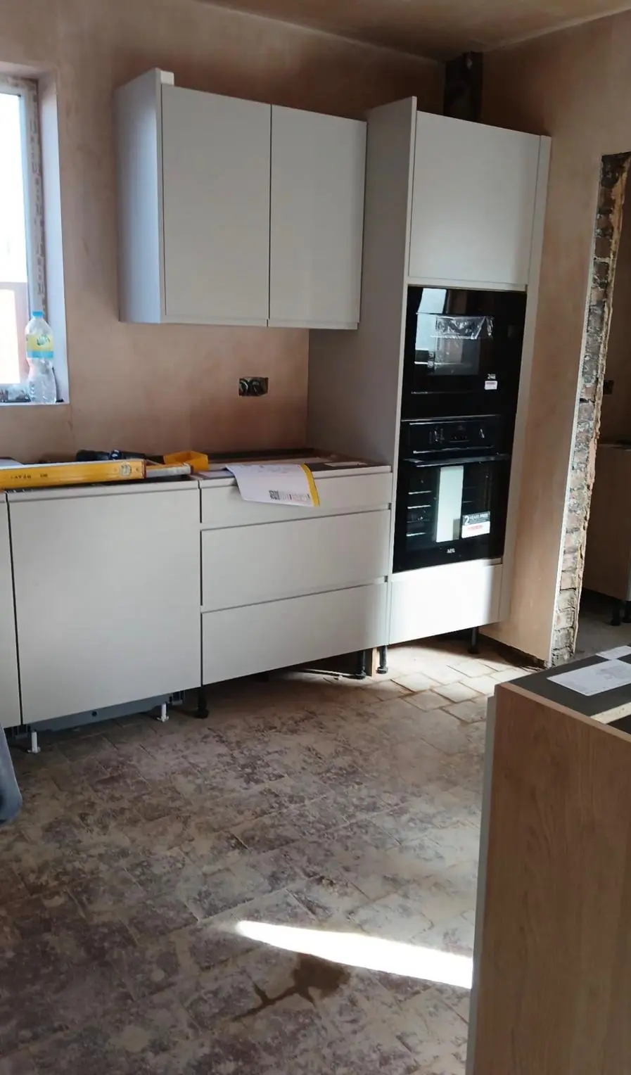 New kitchen going in: tall oven housing and wall units